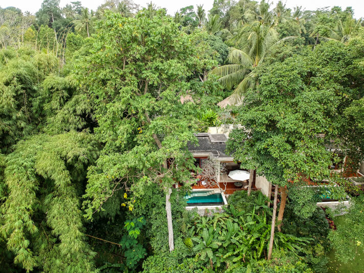 couples coordinates dji drone shot of four seasons sayan villa with private pool