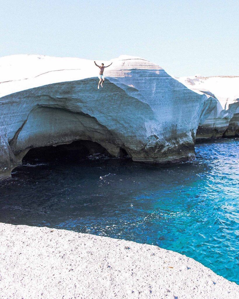 michael cliff jumping sarakiniko milos greece couples coordinates less traveled islands